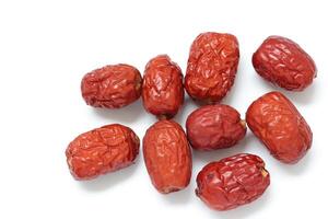 Dried fruit on white background, dried jujube on white background photo