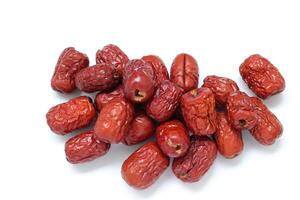 Dried fruit on white background, dried jujube on white background photo