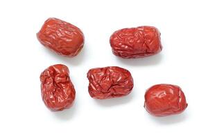 Dried fruit on white background, dried jujube on white background photo