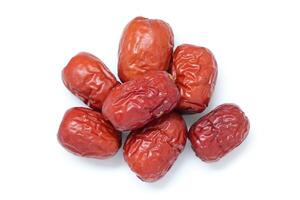 Dried fruit on white background, dried jujube on white background photo