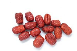 Dried fruit on white background, dried jujube on white background photo