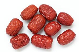 Dried fruit on white background, dried jujube on white background photo