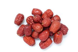 Dried fruit on white background, dried jujube on white background photo