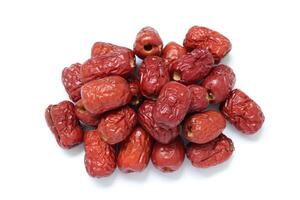 Dried fruit on white background, dried jujube on white background photo