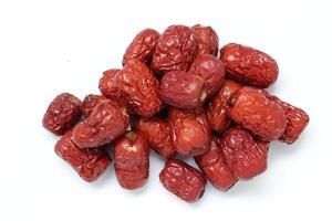 Dried fruit on white background, dried jujube on white background photo