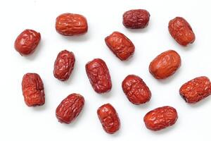 Dried fruit on white background, dried jujube on white background photo