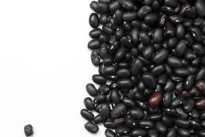 Black beans, top view of black beans seeds background photo