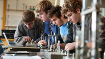 High school students conducting hands-on engineering experiment in lab photo