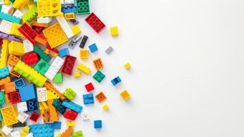 Top view of assorted building blocks on white surface photo