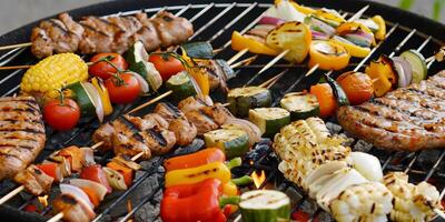 Assorted Grilled Vegetables and Meats on Barbecue for Party photo