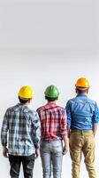 Worker team standing on white background with colorful helmets photo