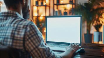 Man in Home Office with Modern Desktop Setup photo