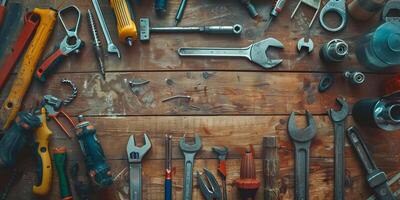 Top view of different tools on wooden surface photo