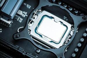 Installation of Computer CPU on a Motherboard Close-Up photo