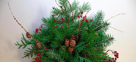 A small decorated Christmas tree for Christmas and New Year photo