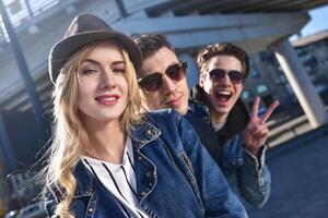 Portrait a group smiling and grin friend in sunglass having fun photo
