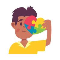 A boy holding up a puzzle piece with a heart vector