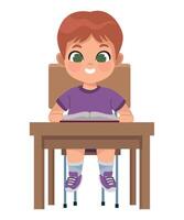 A boy sitting at a desk with a book vector