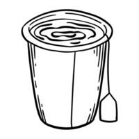 A cup of tea with a spoon in it vector