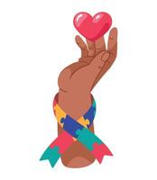 Hand holding a heart with autism ribbon vector