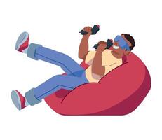A man sitting in a bean bag chair with a controller vector