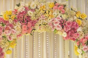 Beautiful Artificial Flowers in colorful composition with bling diamond beads Background photo