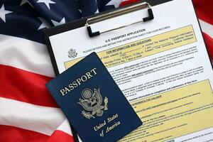 Department of State form DS11 Application for a U.S. Passport lies on table and ready to fill photo
