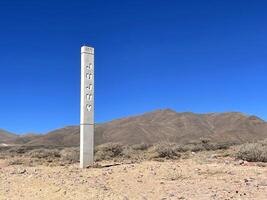 Obelisk with the Jujuy inscription in the Andes, Jujuy region, Argentina photo