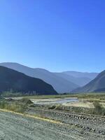 Empty road on the way to the Andes from Salta, Argentina photo