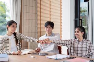 Group of Diverse Students Collaborationg and Study Together in a Modern Classroom Setting photo