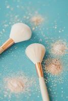 brushes and glitters in blue photo
