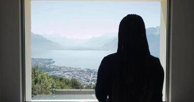 Stunning mountain view through the window, surrounded by serene nature and peaceful beauty video