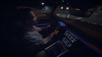 Experience the sophisticated ambiance of night driving in a luxurious and modern vehicle video