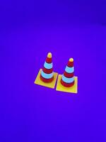 Toy traffic sign on a blue background photo