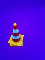 Toy traffic sign on a blue background photo