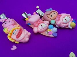clips on a purple background photo