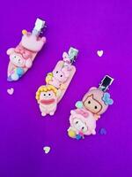 clips on a purple background photo