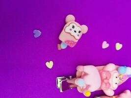 clips on a purple background photo
