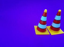 Toy traffic sign on a blue background photo