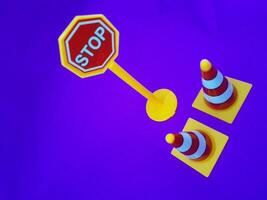 Toy traffic sign on a blue background photo