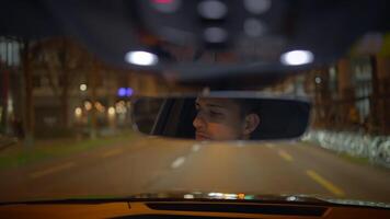 As I reflect on the nighttime driving experience while observing the rearview mirror, video
