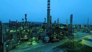 The Industrial Oil Refinery looks impressive at Twilight, with its Infrastructure brightly lit up video
