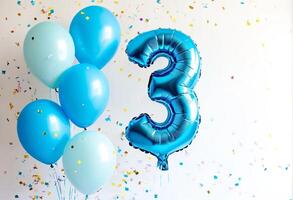A festive celebration of the third birthday with balloons and confetti in blue pastel tones, an inflatable balloon with the number 3 on a white background. photo