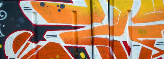 Colorful background of graffiti painting artwork with bright aerosol outlines on wall. Old school street art piece made with aerosol spray paint cans. Contemporary youth culture photo