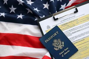 Department of State form DS11 Application for a U.S. Passport lies on table and ready to fill photo