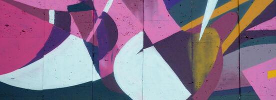 Colorful background of graffiti painting artwork with bright aerosol outlines on wall. Old school street art piece made with aerosol spray paint cans. Contemporary youth culture photo