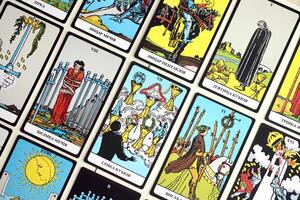 KYIV, UKRAINE - JULY 10, 2024 Tarot minor and major arcana cards of Rider Waite esoteric deck. Many tarot cards for fortune telling and esoteric actions photo