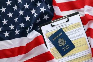 Department of State form DS11 Application for a U.S. Passport lies on table and ready to fill photo