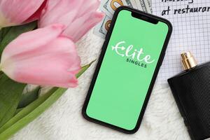 KYIV, UKRAINE - FEBRUARY 23, 2024 Elite Singles logo of famous dating website or app on iPhone display photo