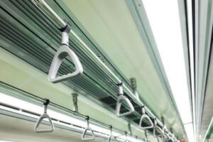 Close Up Train, Subway or Metro Hanging Hand Rail photo